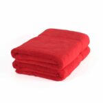 Ensemble de deux serviettes de bain unies rouges